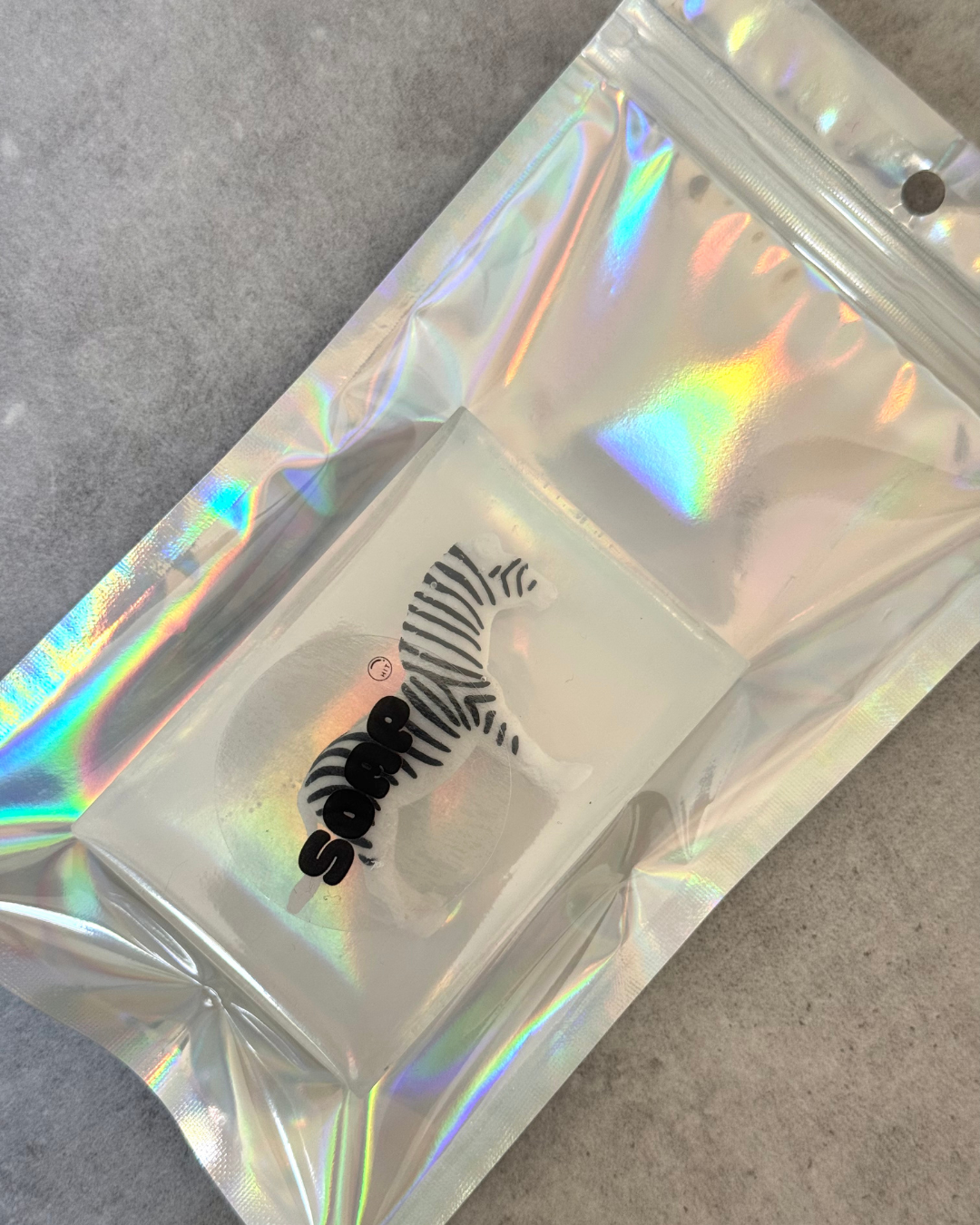 savon transparent avec figurine zèbre emballage